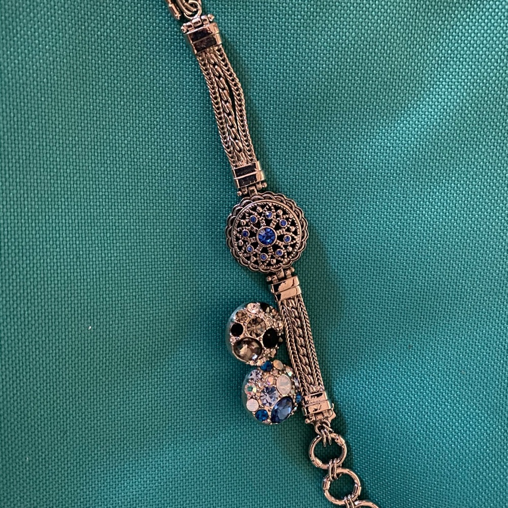 Magnolia and vine bracelet with charms